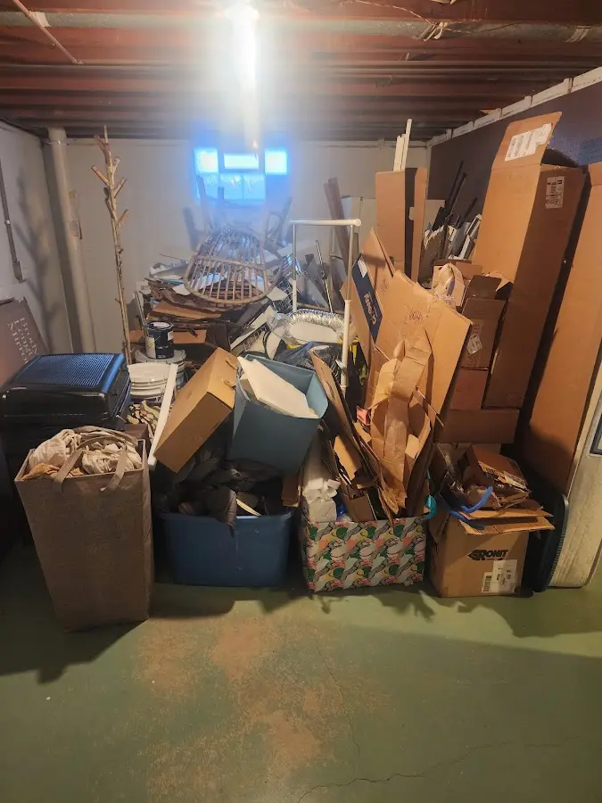 Roll-off dumpster container at job site for 15 Yard Dumpster Rental in Hartsville-Trousdale County